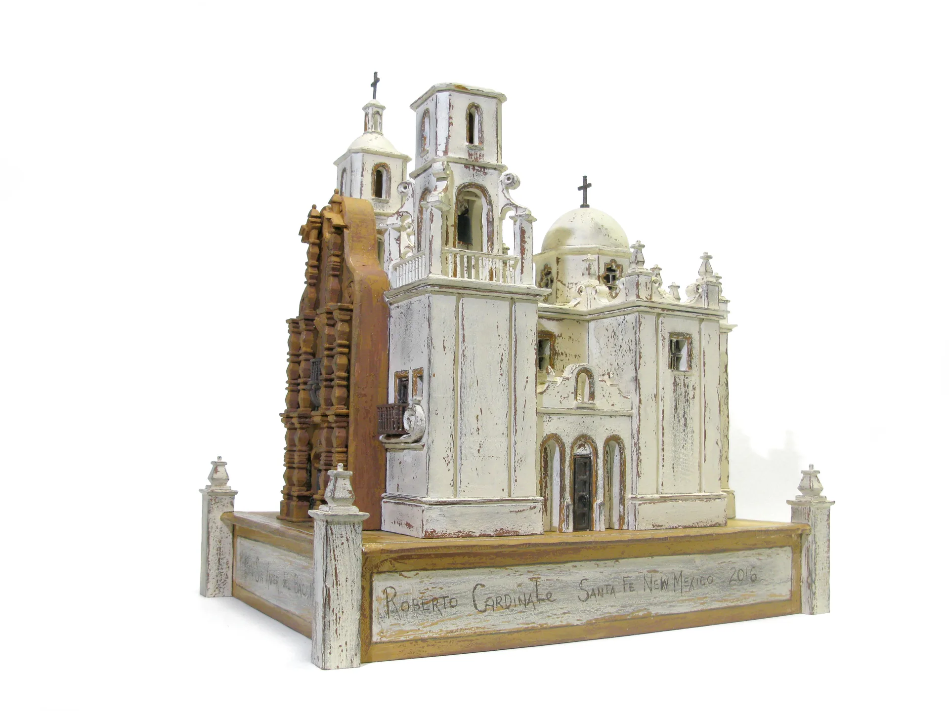 Mission San Xavier del Bac sculpture by Roberto Cardinale, front three-quarter view of the white mission with its two towers, one left unfinished as at the original.