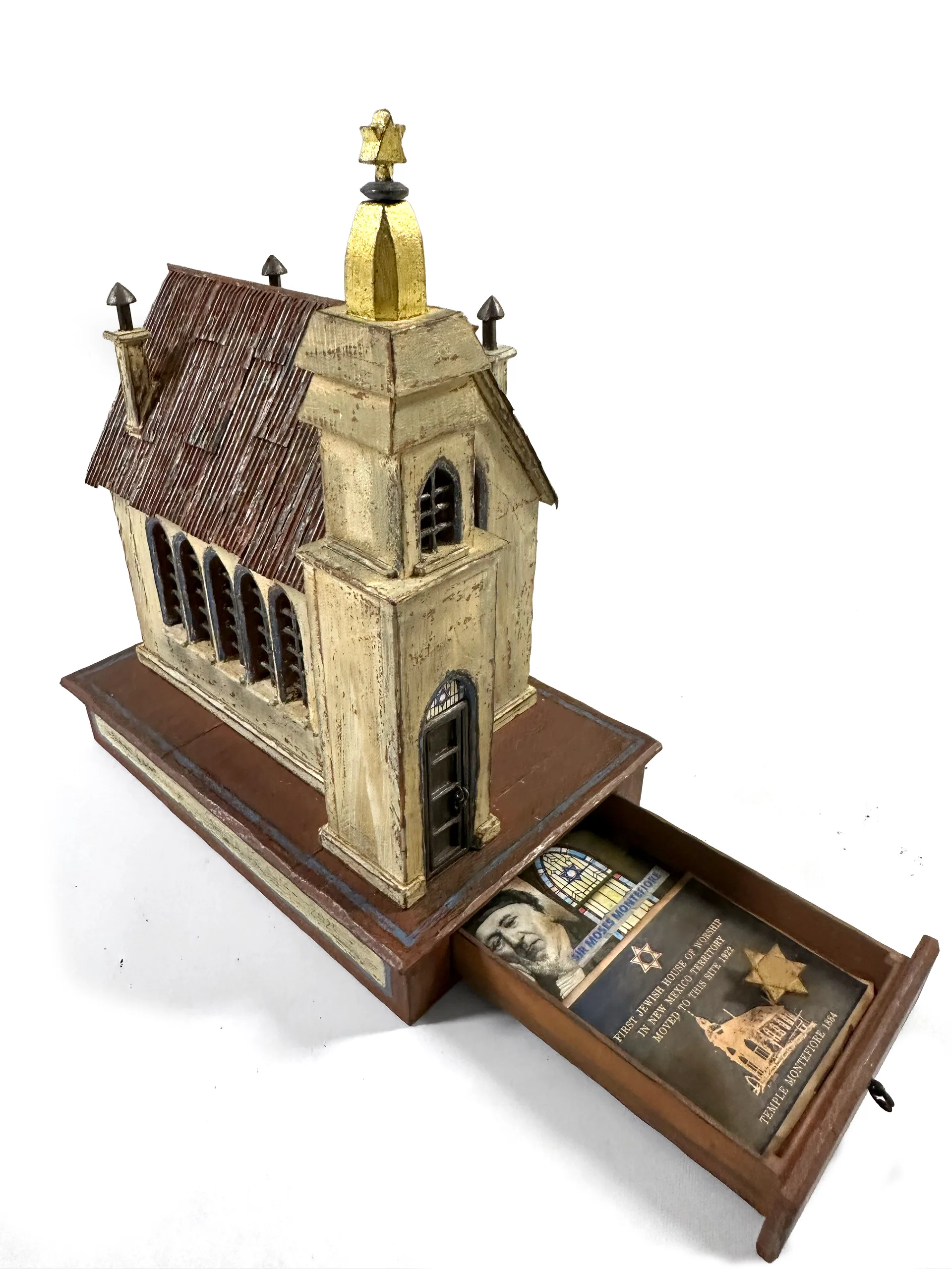 Synagogue Montefiore sculpture with the base drawer open, revealing PJ Cardinale’s collage.