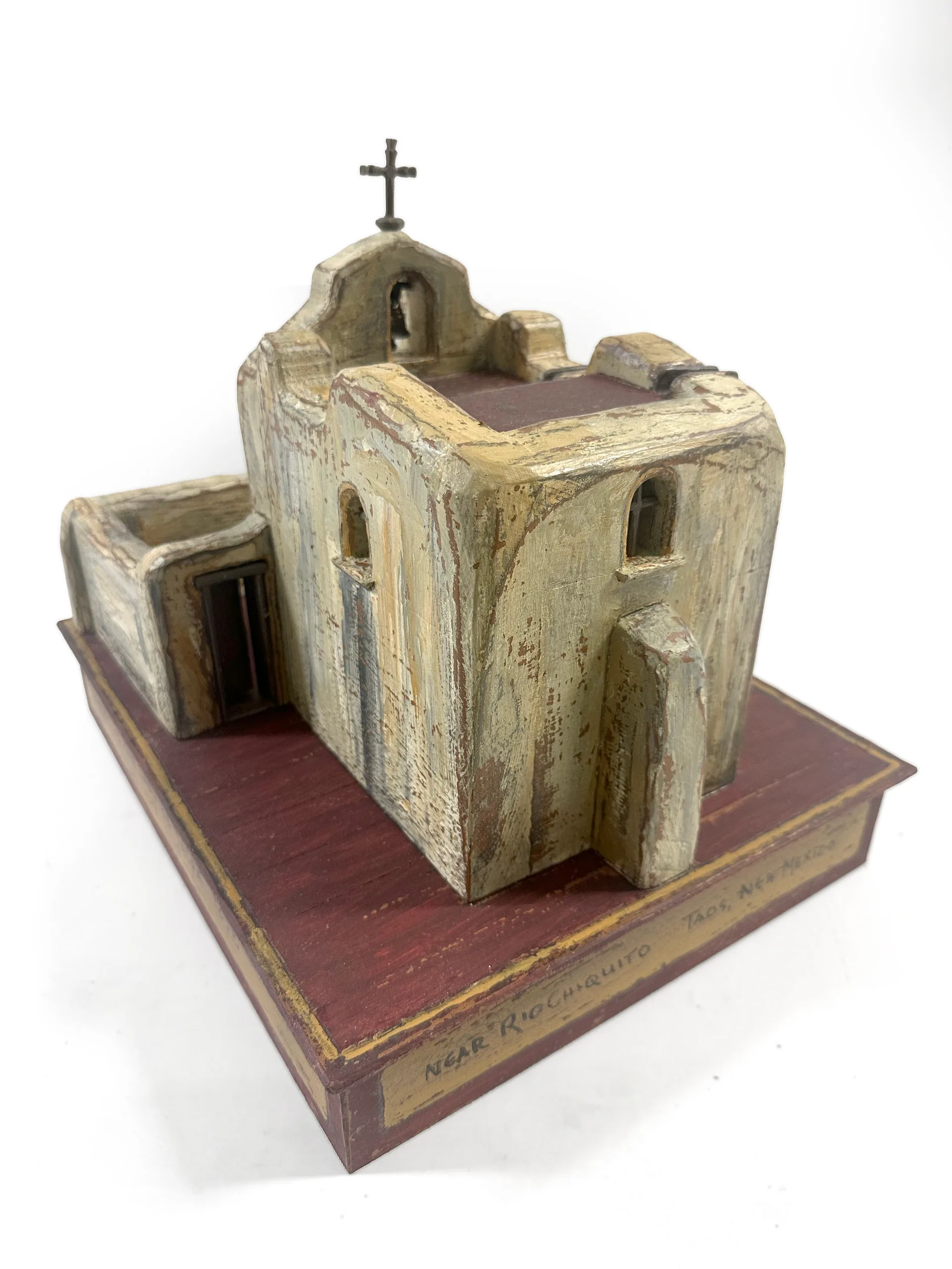 The Talpa Chapel sculpture from the rear, showing the sacristy and the thick adobe walls.